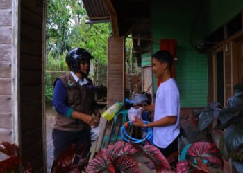 Sekda Rida Ananda Bersama Kwarcab Pramuka Kota Payakumbuh Salurkan 111 Paket Sembako