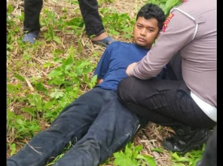 Wanda saat menjalani rekonstruksi awal kasus dugaan mutilasi, Kamis (19/6).