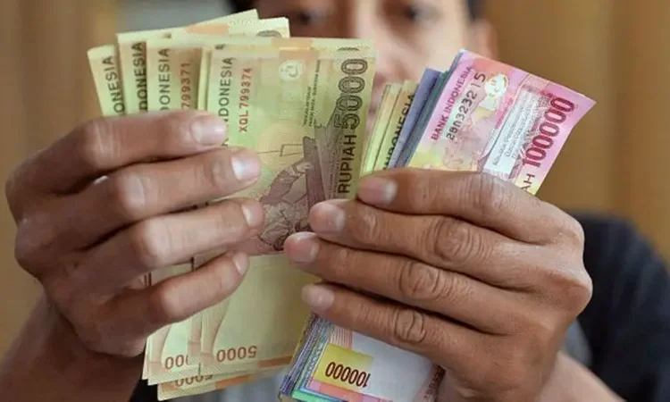 Ilustrasi foto uang rupiah. Foto: AFP