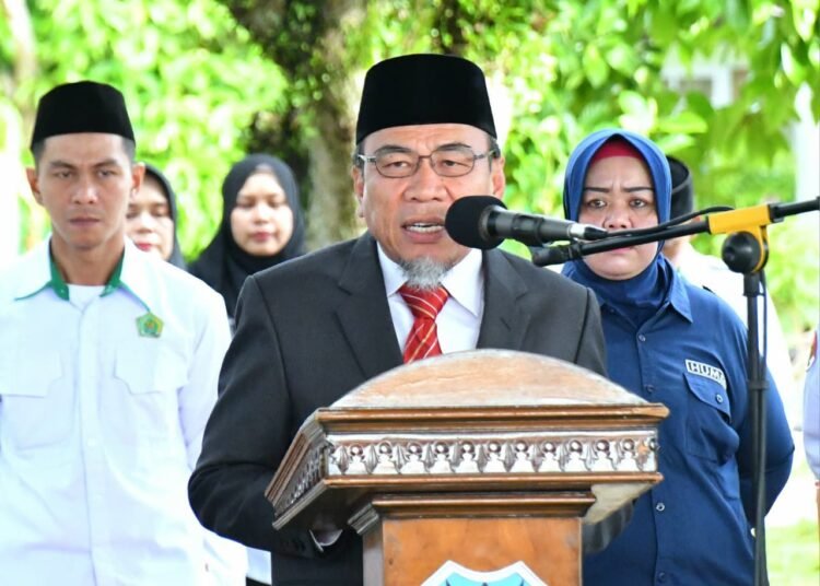 Wawako Padang, Maigus Nasir pimpin upacara Hari Amal Bhakti (HAB) ke-80 tahun Kemenag RI tingkat Kota Padang yang berlangsung di Aula MAN 2 Padang, Sabtu (3/1/2026).