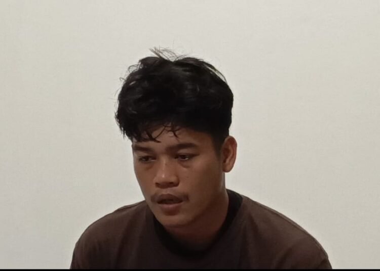 Ilman Suhdi (26 tahun), tersangka penganiaya Saudah, nenek usia 67 tahun di Pasaman.