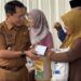Pemkab Padang Pariaman Salurkan Bantuan Rintisan Usaha kepada 100 UMKM Terdampak Bencana