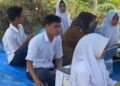 Internet Sulit, Pelajar SMP di Limapuluh Kota Ujian di Atas Bukit