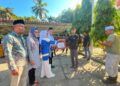 Pemkab Dharmasraya Serahkan Hewan Kurban Bantuan Presiden Prabowo di Sungai Kambut
