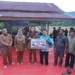 Pemkab Dharmasraya Salurkan Bantuan Alsintan dan 96 Ton Benih Padi untuk Kelompok Tani