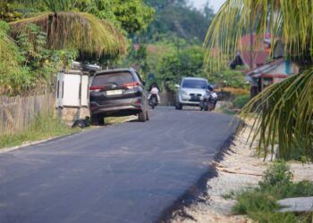 Pemkab Dharmasraya Genjot Pengaspalan Jalan di Pulau Punjung