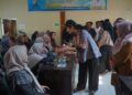Bupati Dharmasraya Salurkan Bantuan Permakanan Tahap III untuk Ratusan Ibu Hamil dan Menyusui