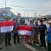 Pemkab Dharmasraya Bagikan Ratusan Bendera Merah Putih kepada Warga Jelang HUT RI ke-81