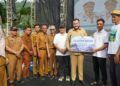 Pemko Padang Salurkan Bantuan Rp8 Miliar untuk Pelaku Usaha Terdampak Bencana