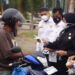 Lindungi Warga dari Kabut Asap, Pemkab Dharmasraya Bagikan Ribuan Masker