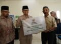 Pemko Bukittinggi Bersama Baznas Salurkan Zakat Untuk 52 Mustahik